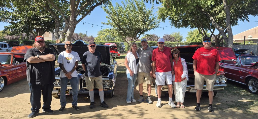 Pontiacs of Central California members lined up in front of their cars at the 2026 Valley Nationals